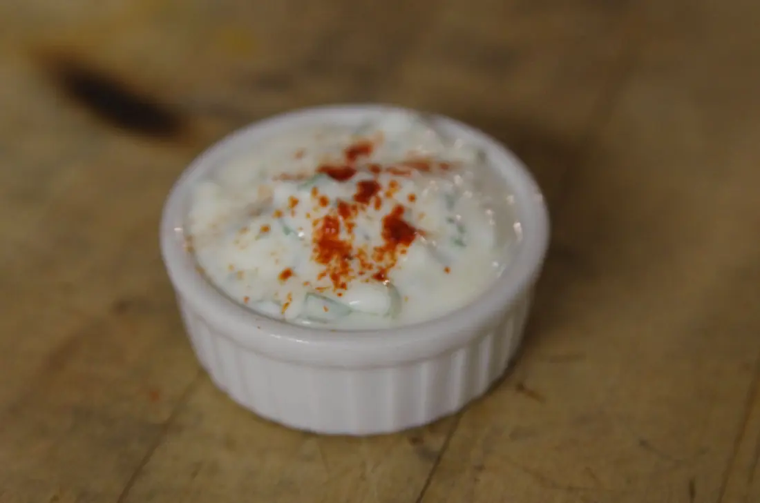 A dipping bowl of creamy sauce