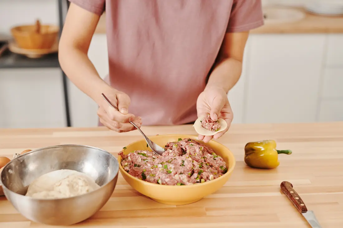 A dumpling filling being made