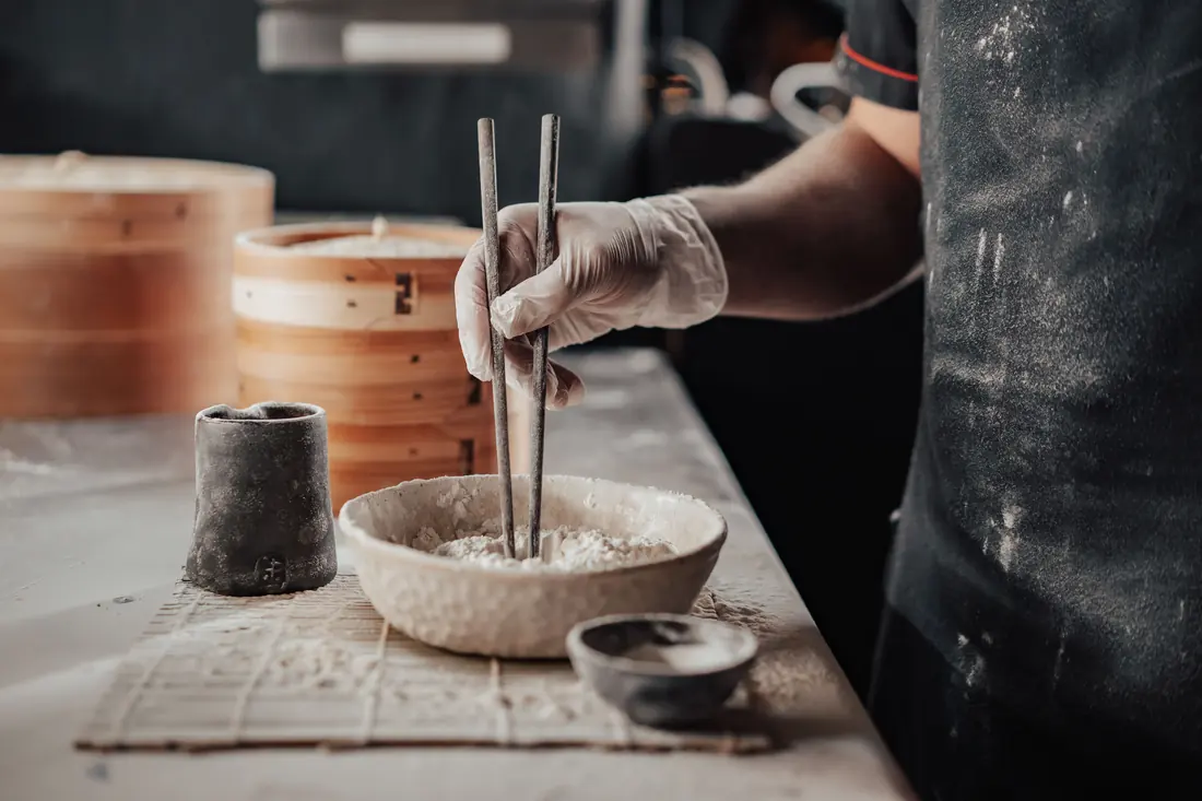 A bowl of plain rice in a kitchen