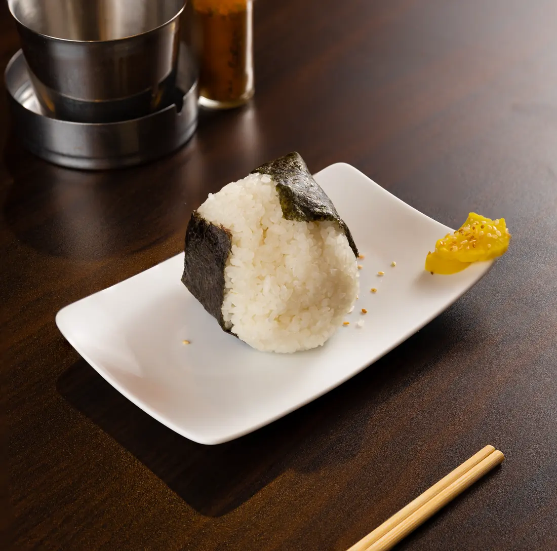 A rice ball on a plate