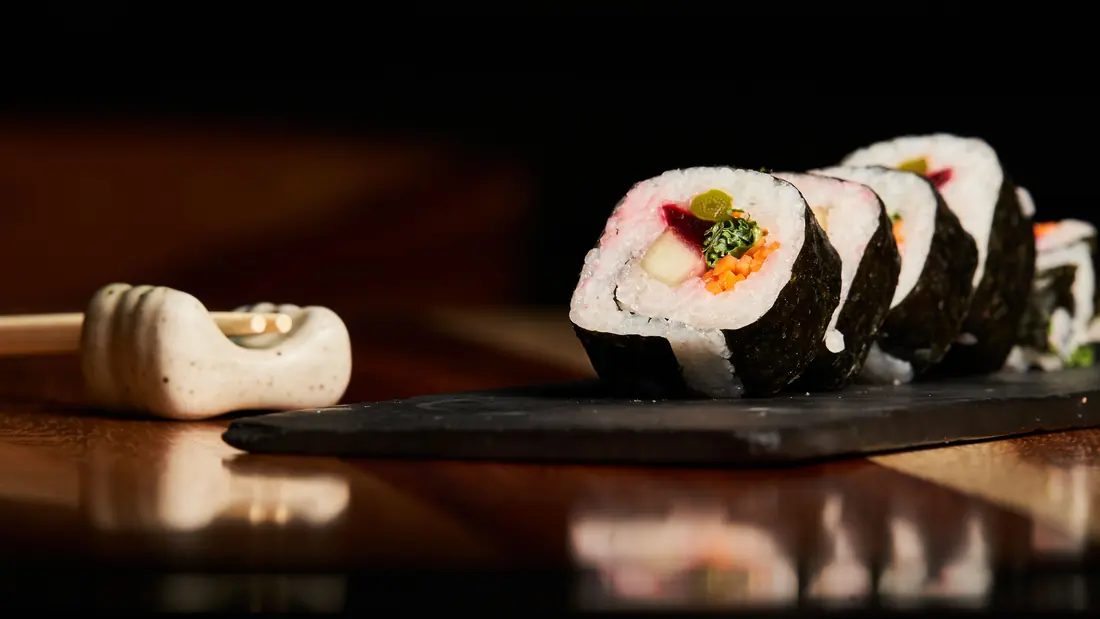 A roll wrapped in dark seaweed