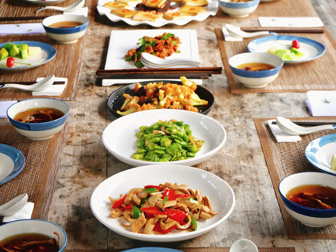 A shared table of Chinese dishes