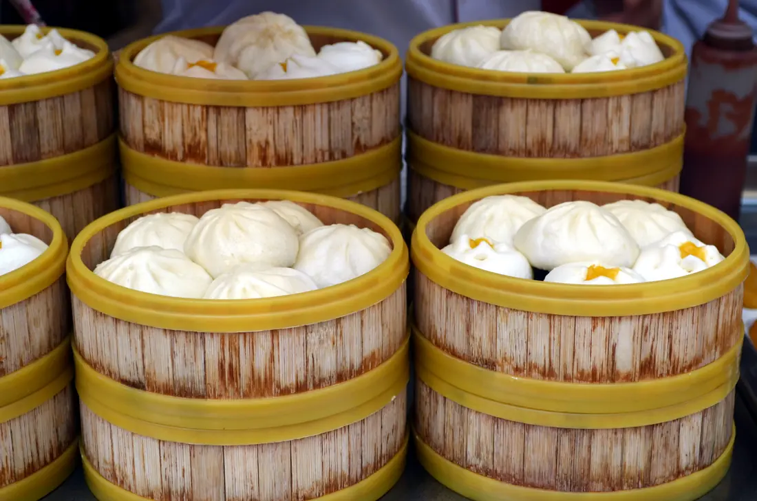 Steamed buns in bamboo steamers