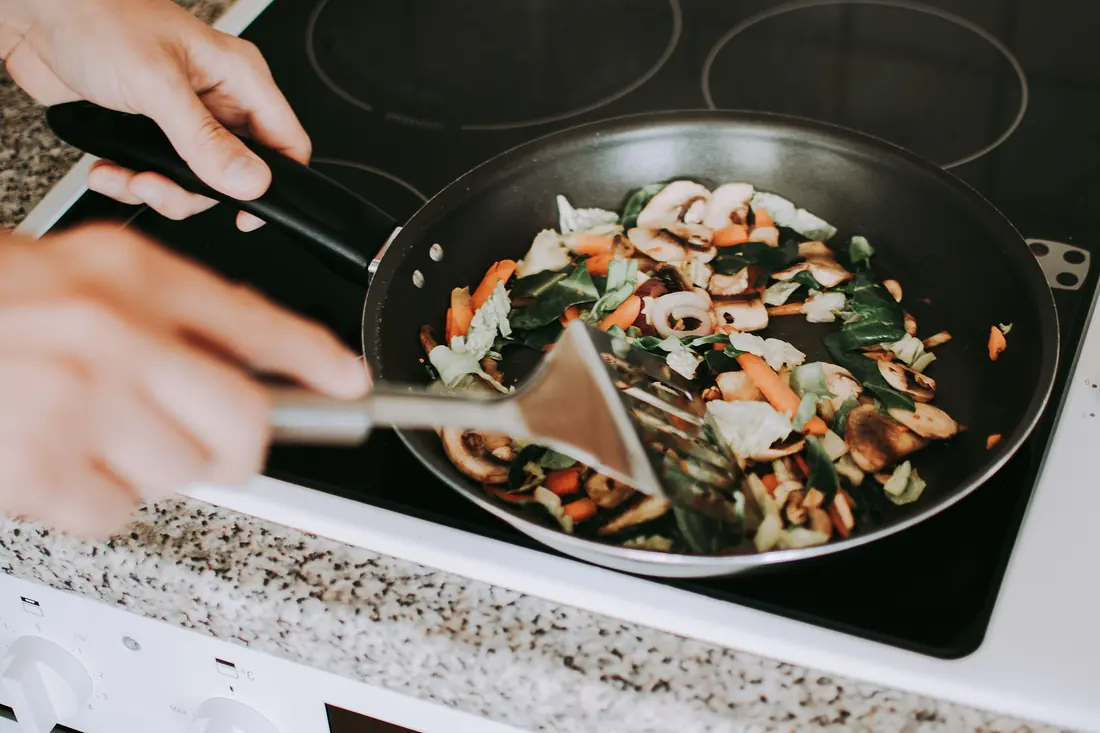 A stir fry containing pale vegetables