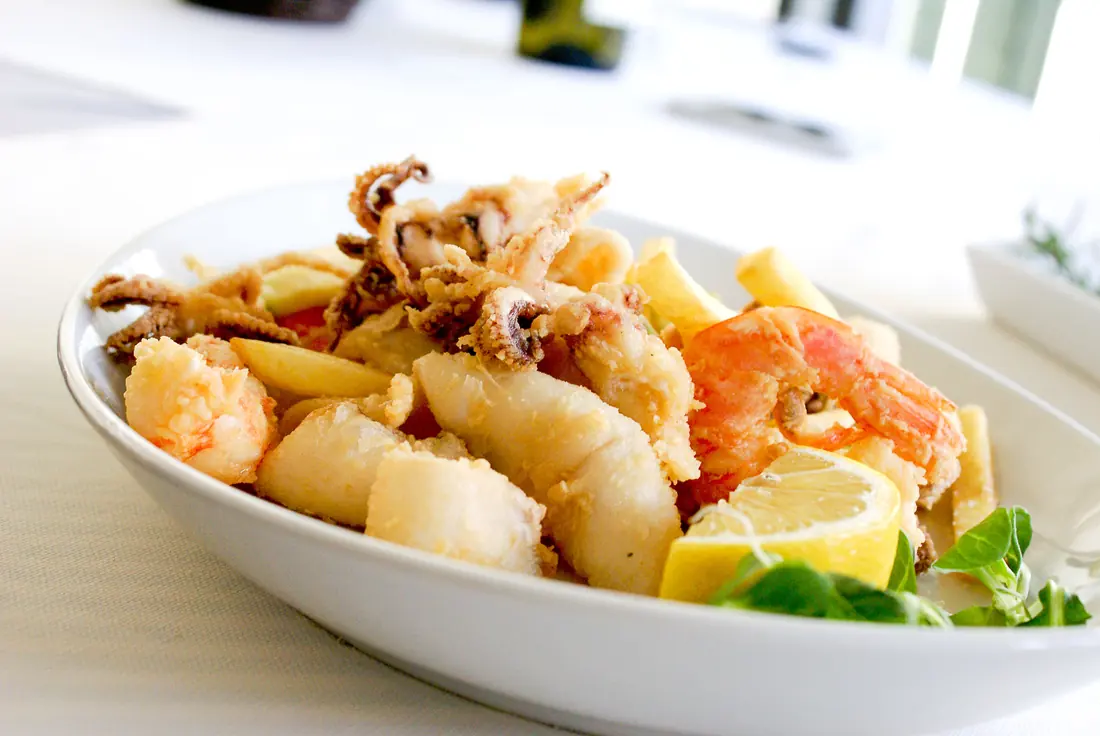 A bowl of fried seafood