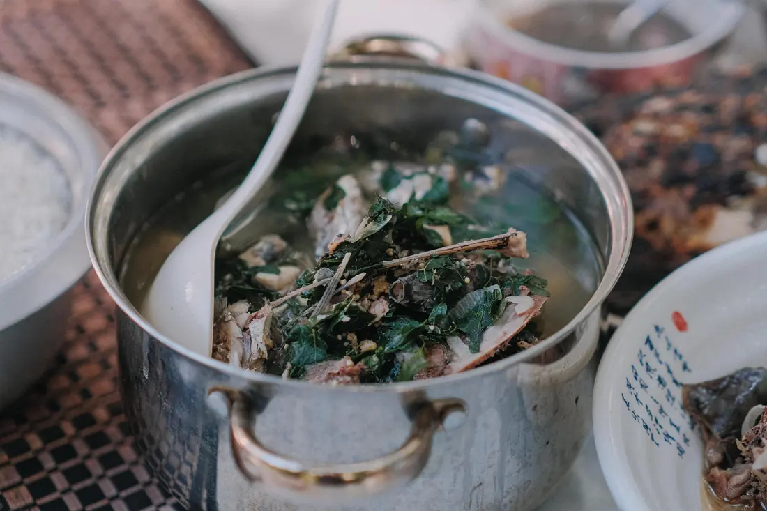 A stockpot of broth simmering