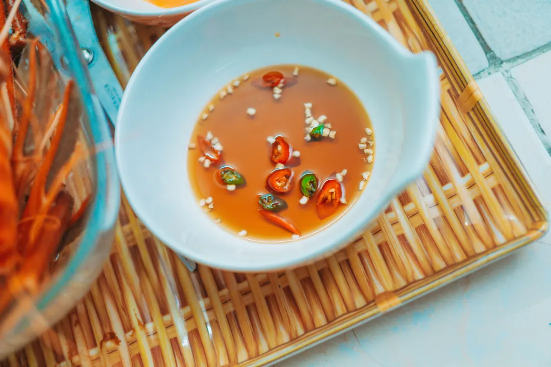 Red chilli sauce in a white dish