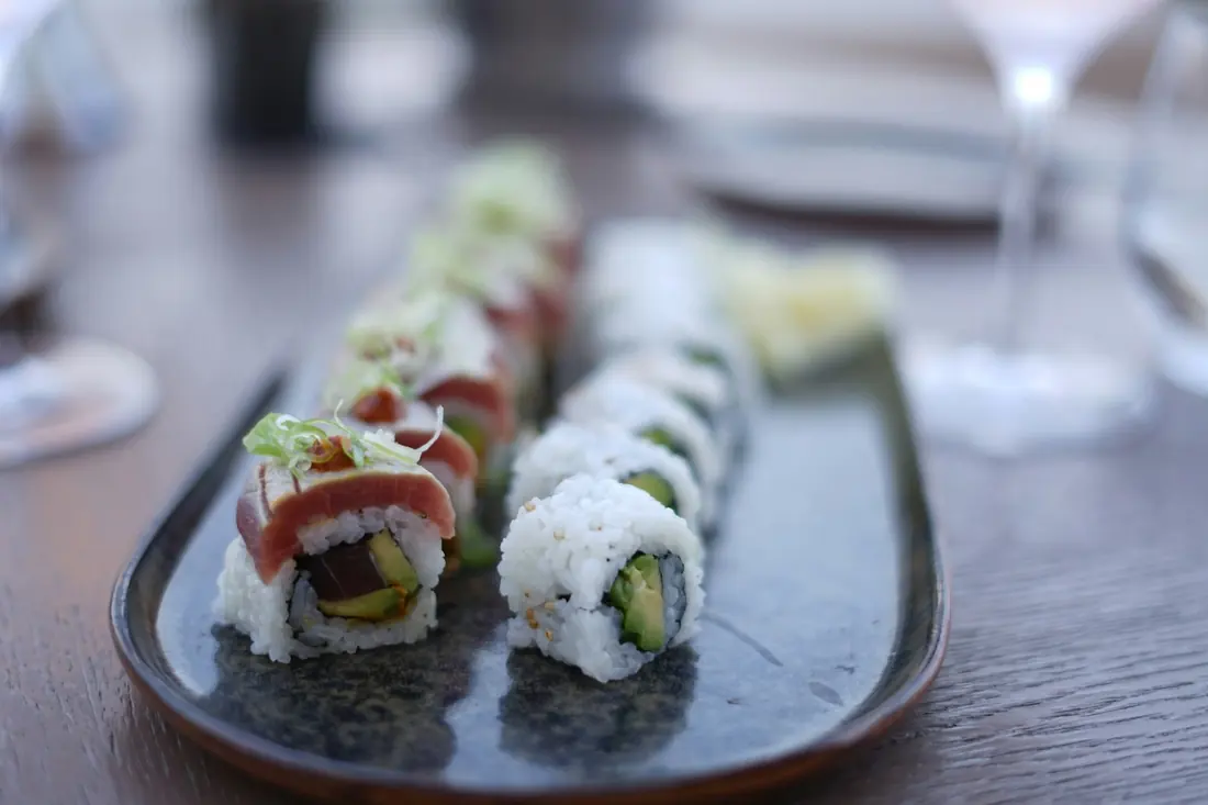 A cut maki roll laid out in even pieces