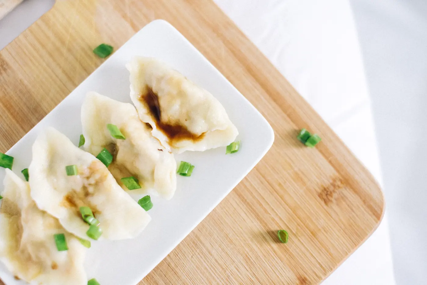 Dumplings drizzled with a dark sauce