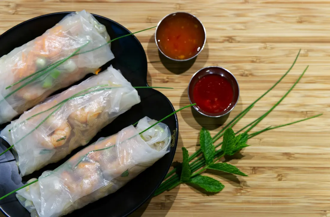 Translucent fresh rolls filled with herbs and vegetables
