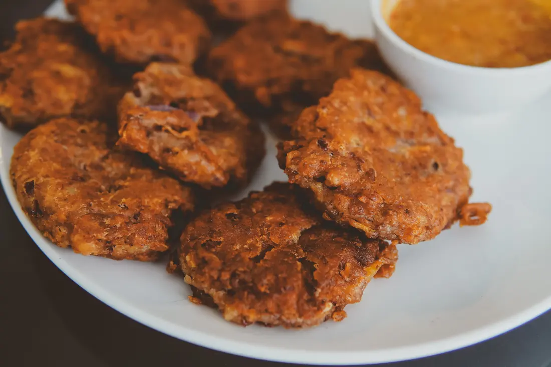 Fritters with an orange dipping sauce