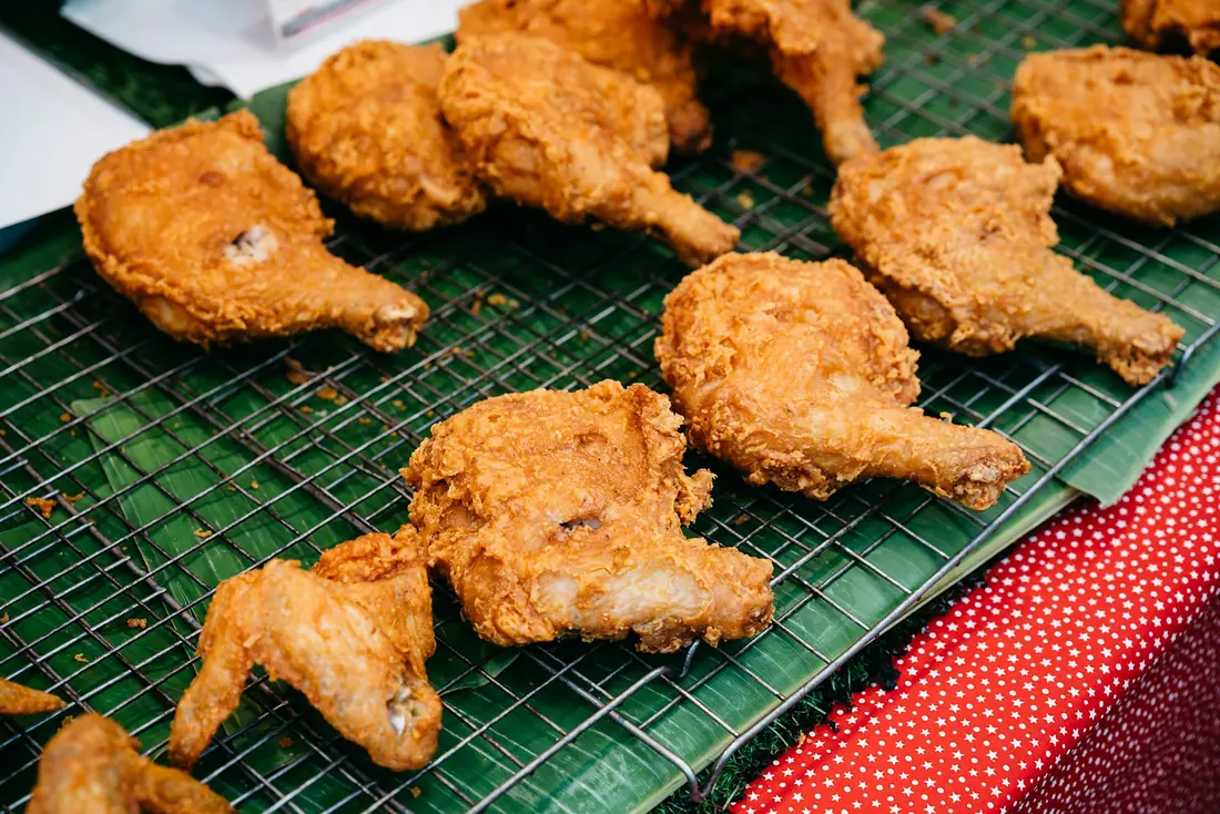 Fried food resting on a wire rack