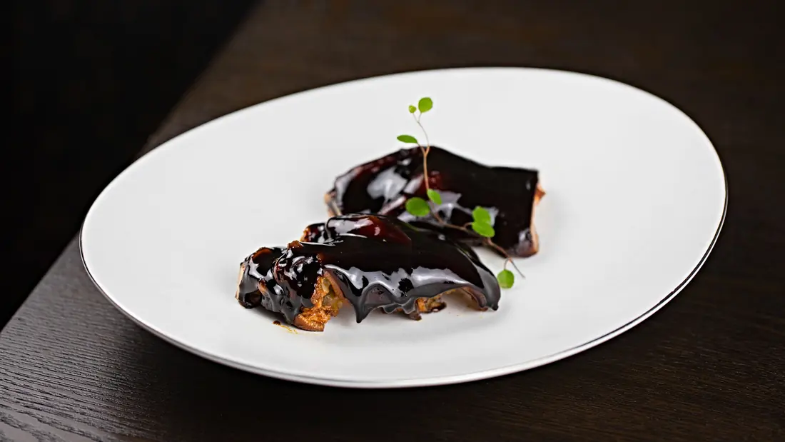 Food finished with a dark glossy glaze