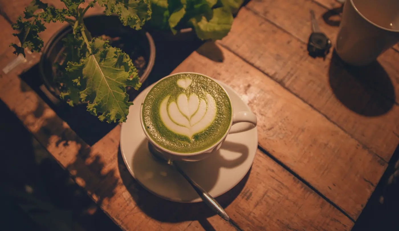 A matcha latte in a cup