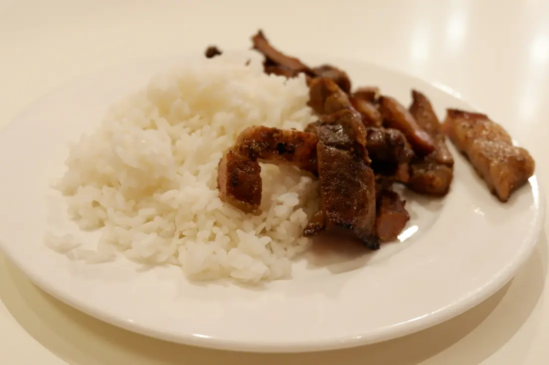 Grilled sliced beef served with rice