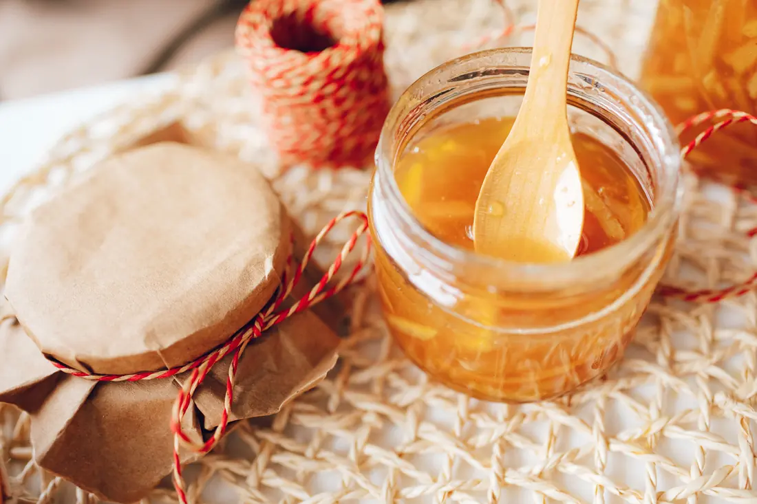 Orange preserve in a glass jar