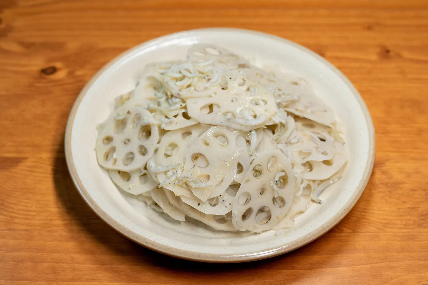 Pale root slices with holes through them