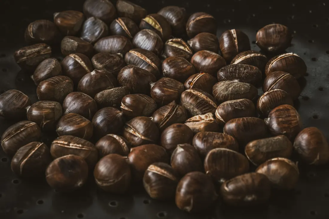 Dark brown corms in a pile
