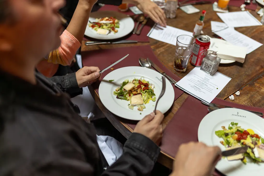 People eating together at a table