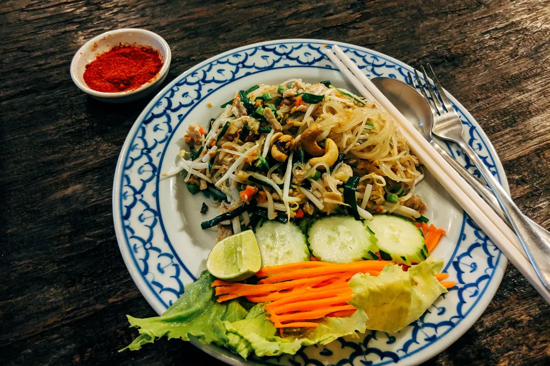 A side plate of Thai basil, lime and bean sprouts