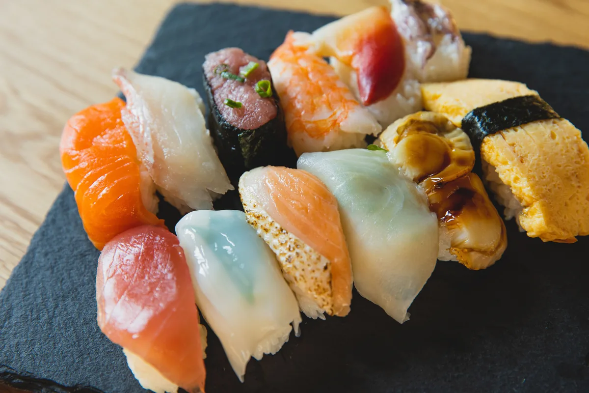 Assorted nigiri and sashimi with fresh salmon and tuna