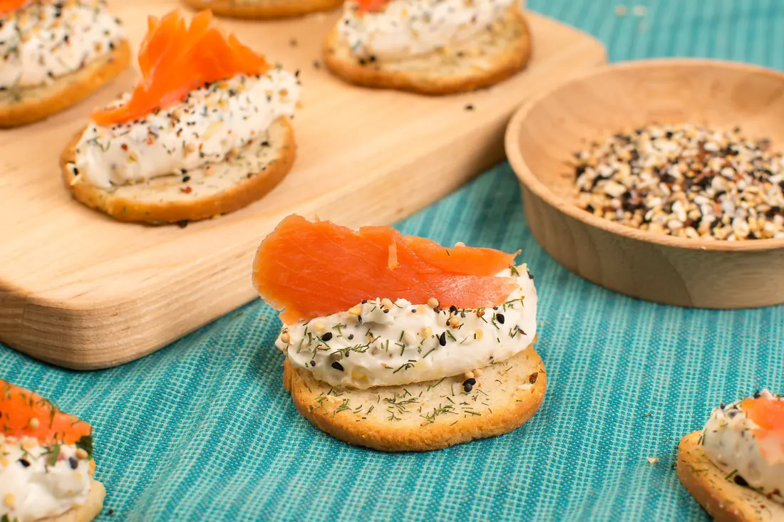 Smoked salmon and soft cheese on crackers