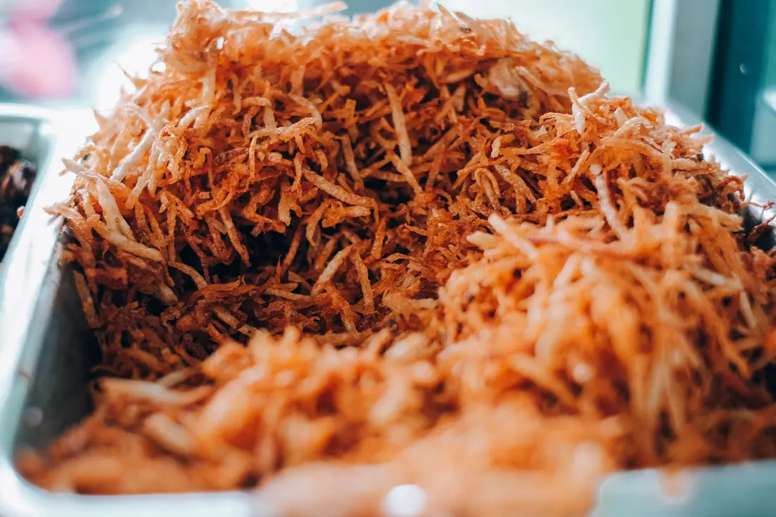 A tray of fine shredded topping