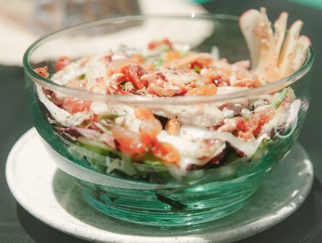 Shredded seafood salad dressed in a bowl