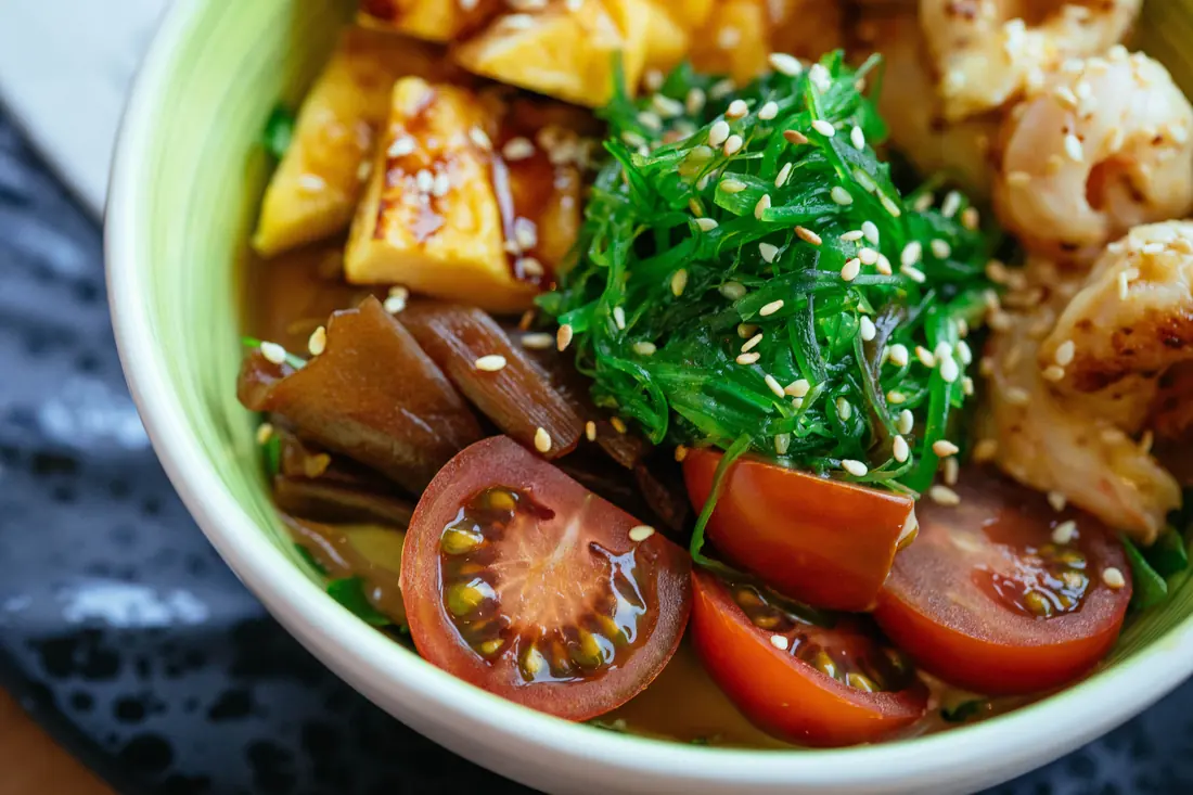 Cubes of soft tofu and rehydrated seaweed