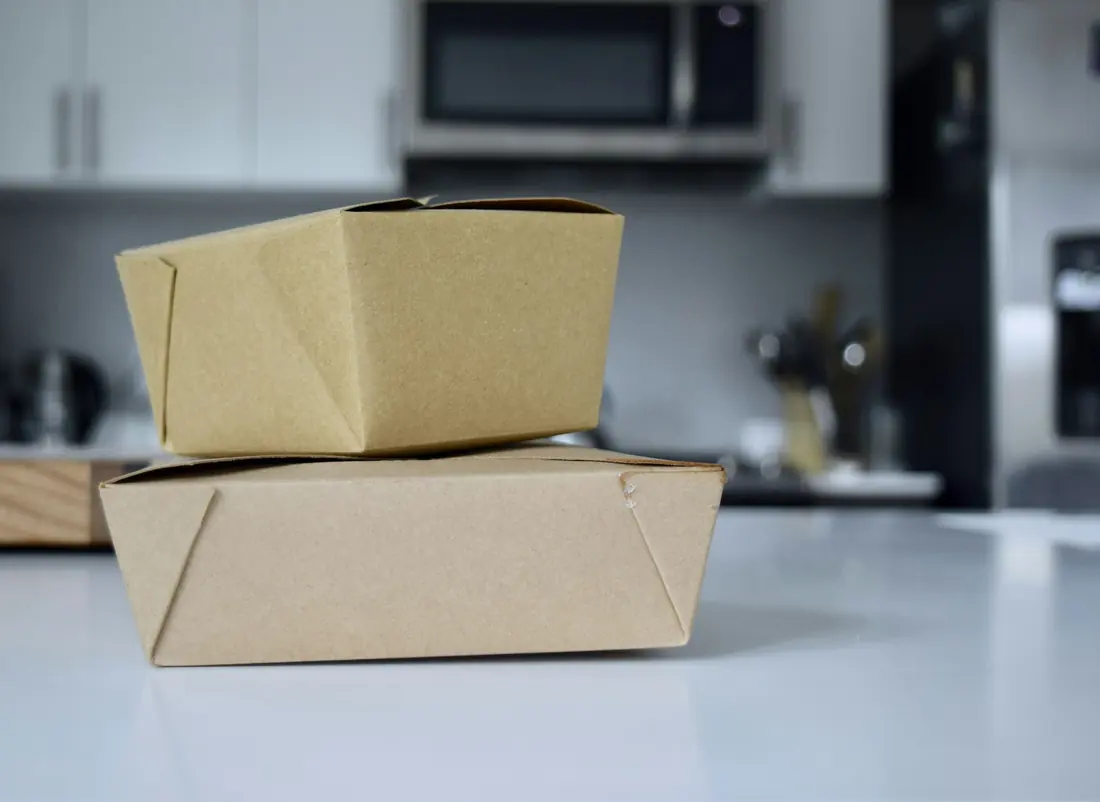 Takeout containers stacked and ready for collection