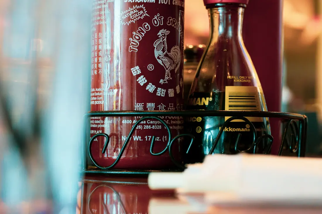 Sauce bottles on a restaurant table