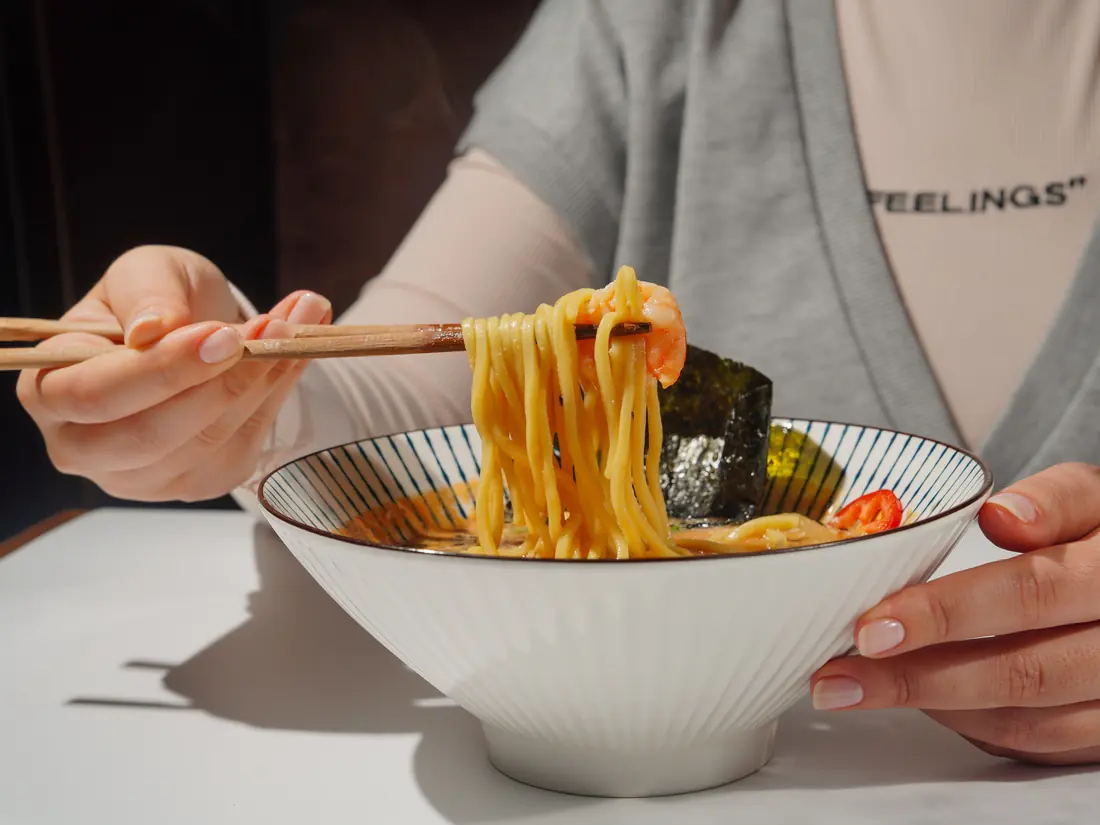Strips of seaweed on a noodle bowl