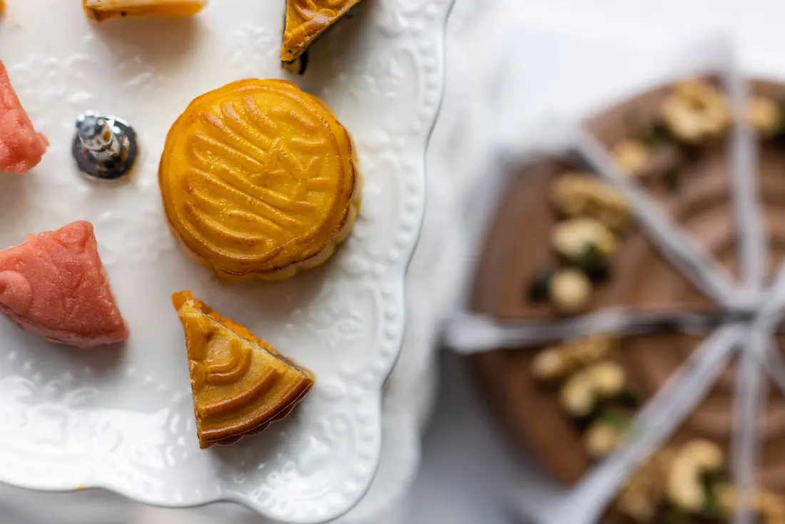 A mooncake and sliced pastries