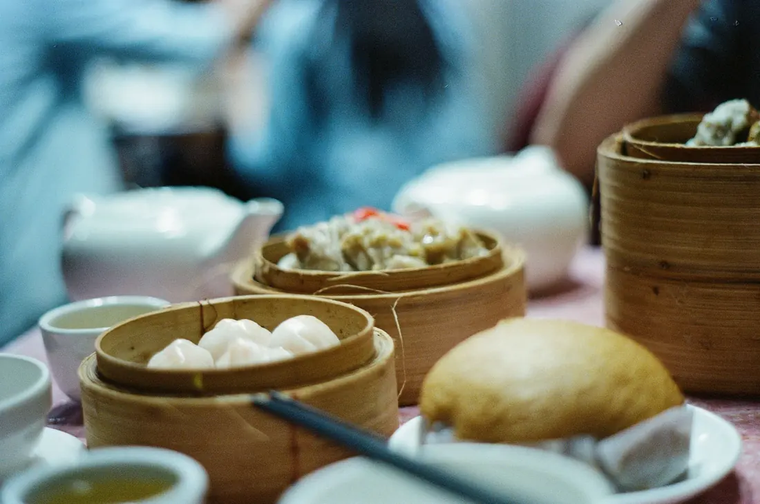 Tea poured beside steamer baskets