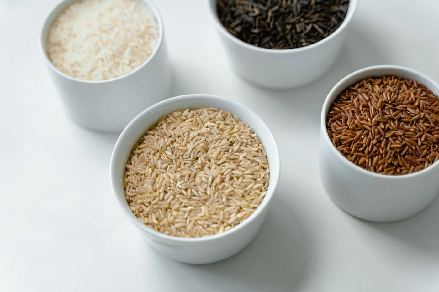 Bowls of several different rice varieties