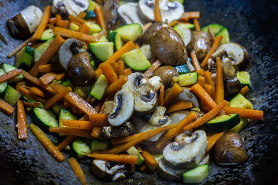 Stir-fried vegetables in a hot pan