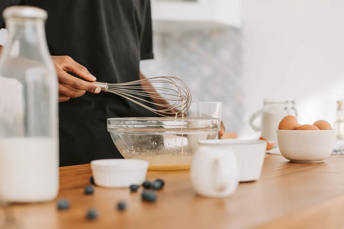 Ingredients being whisked in a bowl