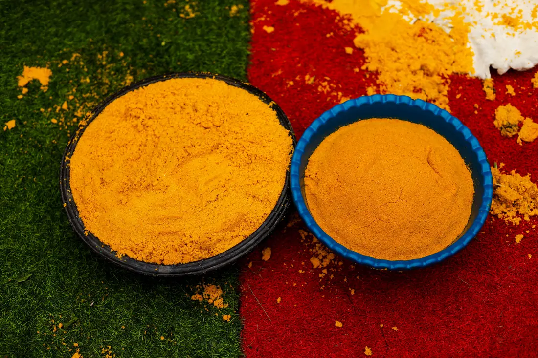 Bowls of bright yellow powder
